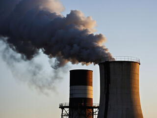 Industrial Impact, Smokestacks Emitting Pollution, Highlighting Environmental Concerns.