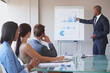 © peopleimages.com - Businessman, people and statistics presentation for discussion, company and financial progress and budget review. Meeting, collaboration and analyst with report document, sale or revenue projections