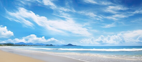 Wall Mural - Scenic view with beautiful blue sky over sandy beach in a picturesque and stunning image with copy space