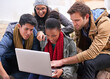 © peopleimages.com - Talking, university and students with laptop on campus for communication, learning or knowledge. Education, diversity and friends with technology for assignment, study group or search internet