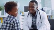 © Ariel Studio - Smiling Pediatrician with Young Patient