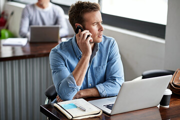 Poster - Laptop, phone call and conversation in office for businessman, strategy and research for project. Technology, smartphone and communication on mobile for male person, creative writer and journalist