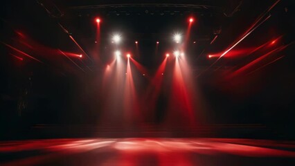 Wall Mural - A stage with red lights shining on it. Scene is bright and energetic