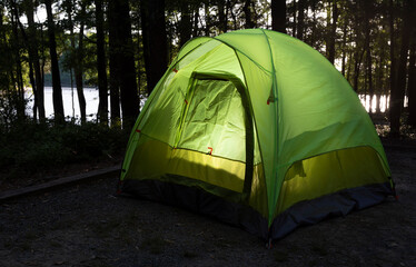 Canvas Print - Lighted yellow and green tent