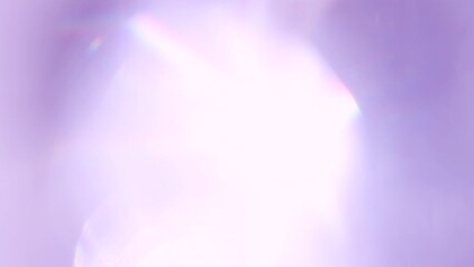 Wall Mural - Shimmery Glare in Ultraviolet. Loop. The light passes through the facets of a slowly rotating diamond and creates repetitive sparkling highlights and rainbow colors