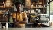 © Wattana - A determined young coffee shop owner stands at the counter, their entrepreneurial spirit shining through as they prepare to tackle another busy day.