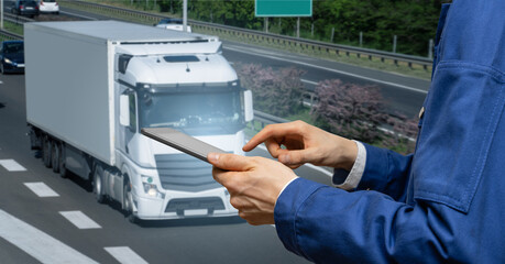 Poster - Manager with a digital tablet on the background of truck. Fleet management..
