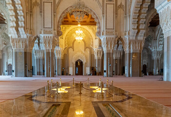 Wall Mural - view of the Qibla or prayer niche and the central nave in the Hassan II Mosque in downtown Casablanca