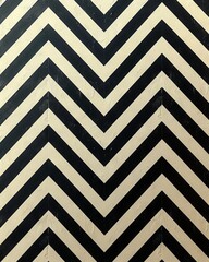 Wall Mural - A black and white chevron pattern on a wall.
