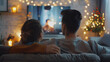 © PatternHousePk - Couple watching TV