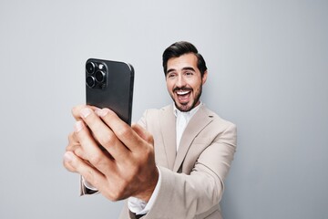 Wall Mural - call man background hold phone confident happy suit business portrait smartphone smile