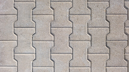 Wall Mural - interlocking block paving floor background beige grey demo example