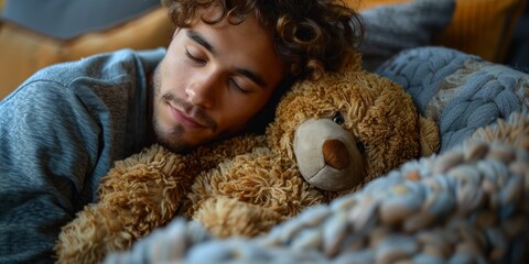A tired man rests in a bedroom, seeking comfort with a teddy bear for solace