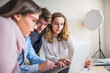 © Halfpoint - Young group of colleagues working on a new project together in a startup company office. Working in co-working space.
