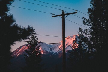 Wall Mural - Mount Shasta with telephone lines running along the landscape.