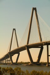 beautiful view of the famous ravenel bridge at sunset