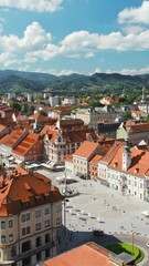 Wall Mural - Maribor cityscape aerial view at sunny day, Slovenia. Maribor is a second largest city in Slovenia. Historic buildings of the Maribor old town and bridge over the Drava river