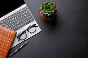 Wall Mural - Office desk table with laptop, cup of coffee and supplies