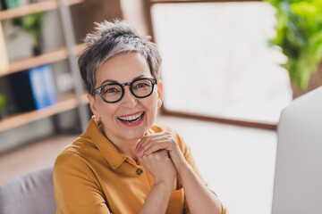 Sticker - Photo of pretty retired woman cheerful smile dressed yellow formalwear modern workplace working home distance office