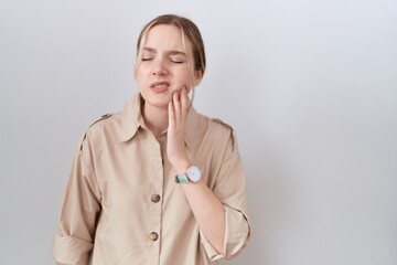 Poster - Young caucasian woman wearing casual shirt touching mouth with hand with painful expression because of toothache or dental illness on teeth. dentist