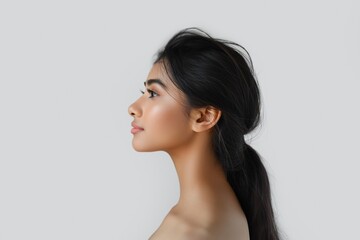 Canvas Print - Profile view of a young woman with delicate features