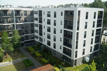 Wall Mural - Modern multistorey building and patio with trees