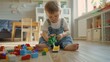 © Studio Nova - Toddler Playing with Colorful Blocks