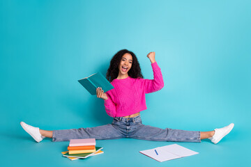 Full size photo of pretty teen girl split study read book winning wear trendy pink outfit isolated on aquamarine color background