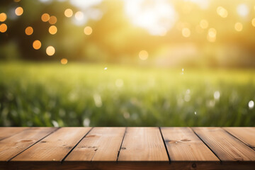 Wall Mural - Empty wooden planks or tabletop in front of a blurred bokeh lush grass nature environment with water drops and maximalist background a product display background or wallpaper concept with backlighting