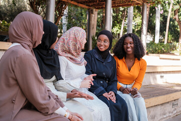 Group of Arab women with hijab meeting and talking to each other. Concept: Friendship