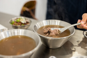 Canvas Print - Fresh raw beef soup in Tainan restaurant