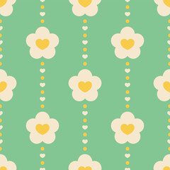 Wall Mural - White and yellow flowers and hearts on green dotted background. Vector seamless pattern in soft retro pastel colors.