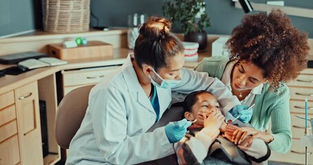 Wall Mural - Dentist, scared and child with mother for consulting, teeth whitening and dental cleaning. Healthcare, dentistry and young girl with anxiety, fear and worry for hygiene, oral care and medical service