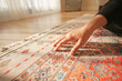 © Towfiqu Barbhuiya  - hand touching new home carpet