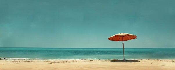 A solitary orange umbrella on a serene, sandy beach against a calm turquoise sea and clear sky, perfect for a peaceful beach getaway.