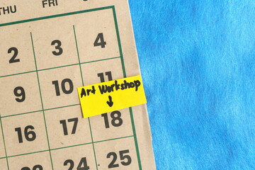 Weekend art workshop class reminder on calendar. Weekend wellness and creativity activity.