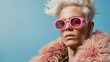 © Pavel Lysenko - A stylish individual with platinum blonde hair dons vibrant pink sunglasses and a fluffy pink coat, striking a confident pose against a sky blue background. Generative AI