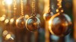 © Emma - metal balls hanging in a line with the released ball concept of cause and effect