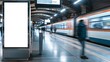 © peerawat - A vertical lightbox billboard with a blank digital screen stands at the train station in this mockup. The white poster is prepared for any advertisement or public information, with the backdrop