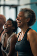 © sam - Fitness, laughing and friends at the gym for training, black seniors pilates class for active retirement lifestyle. exercise in a group for a workout, cardio or yoga in a studio
