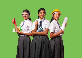 Indian asian schoolgirl in school uniform and career concept