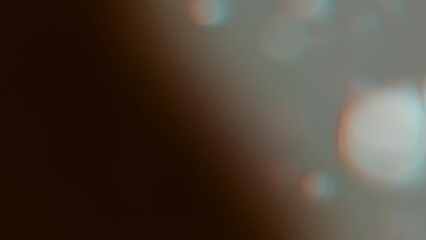 Wall Mural - Animated abstract soft gradient red color with bokeh on dark backdrop