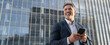 © Stock 4 You - Banner European latin middle age male entrepreneur businessman working on mobile cell phone. Confident mature hispanic senior business man holding smartphone cellphone, using application. Copy space