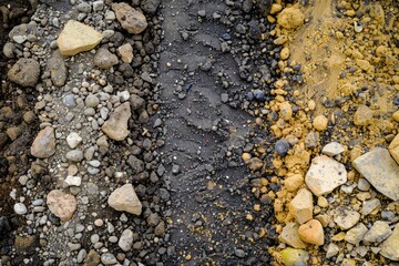 Aufkleber - Detailed view of rocks and gravel on the ground. Perfect for backgrounds or textures