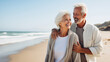 © rohappy - Summer portrait happy smiling mature couple together on sunny coast, enjoying beach vacation at sea