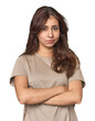 © Asier - Middle Eastern woman in studio suspicious, uncertain, examining you.