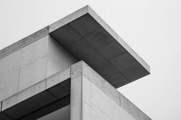 Poster - A black and white image of a modern building. Suitable for architectural design projects