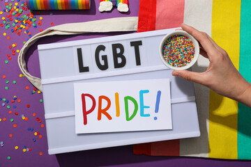 Wall Mural - LGBT parade concept, inscription on white board.