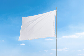 Aufkleber - White flag with clean texture against a vibrant blue sky, perfect for flag mockups or presentations