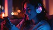 © Sajawal - earphone woman phone young music female happy listening mobile smartphone girl night dark glowing light screen headphone sound wireless radio internet entertainment relax